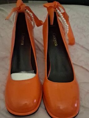 Orange patent wide heel shoes with pearls